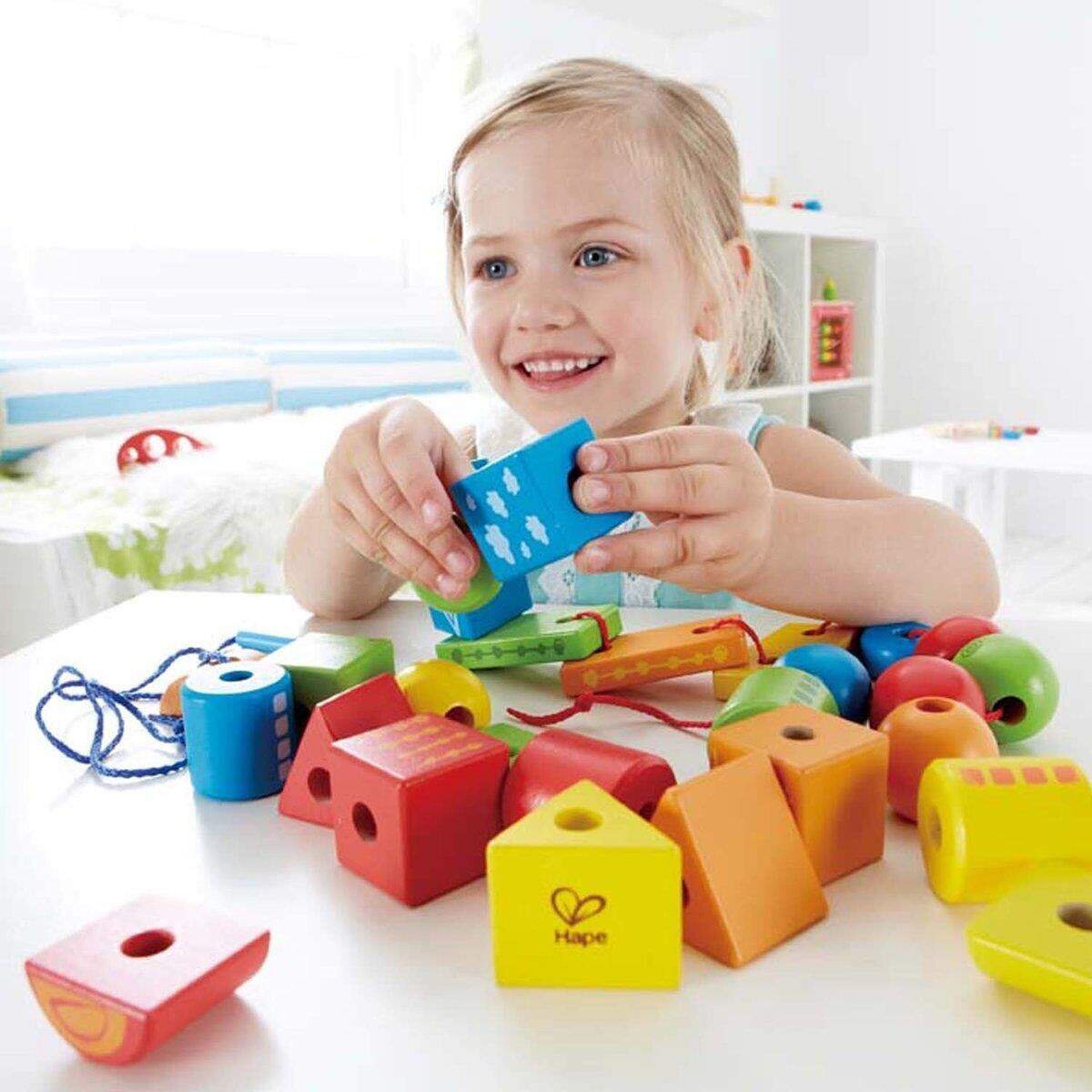 hape-faedelkloetze-aus-bunten-holzformen-46CF741D1.jpg